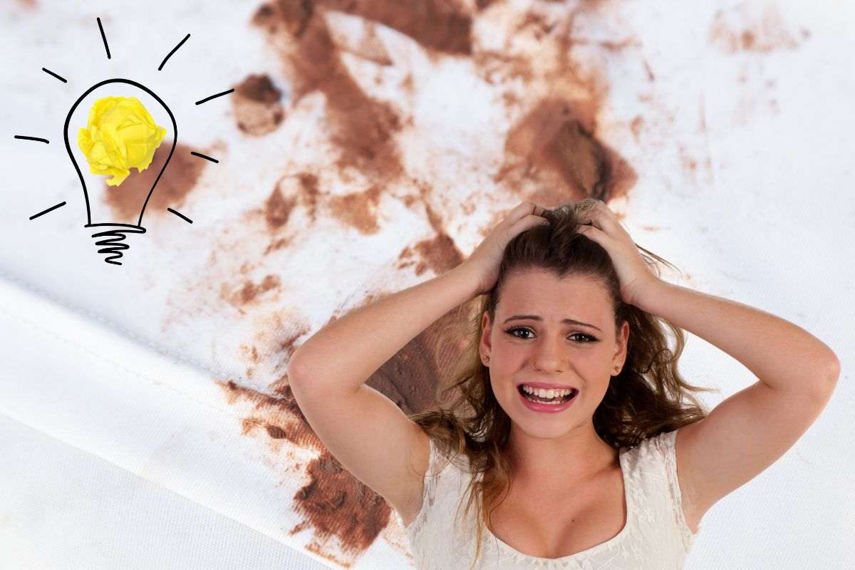 macchia di cioccolato e donna disperata