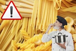 chef, pasta e simbolo attenzione