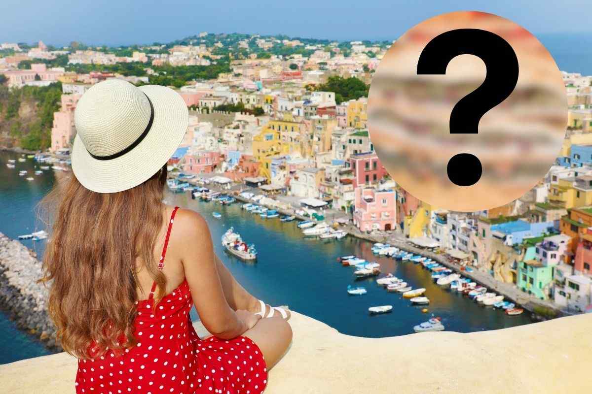 Donna che guarda il mare e punto interrogativo