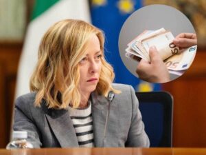 giorgia meloni e sullo sfondo cerchio con all'interno uomo che conta banconote